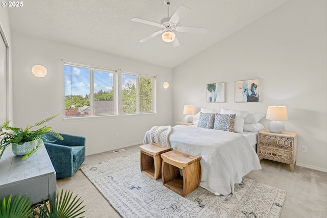 2539 NW 167th Ave, Beaverton, OR 97006 - bedroom with light carpet, vaulted ceiling, baseboards, and a ceiling fan
