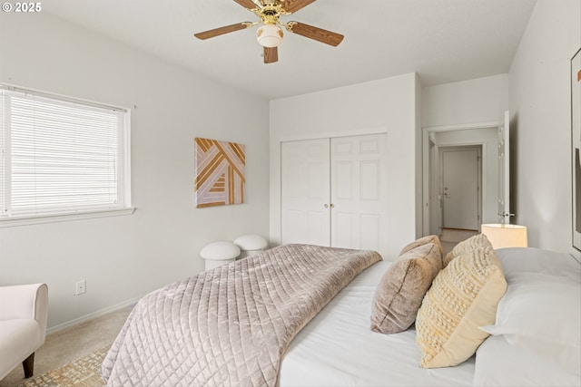 2539 NW 167th Ave, Beaverton, OR 97006 - carpeted bedroom with a closet, baseboards, and ceiling fan