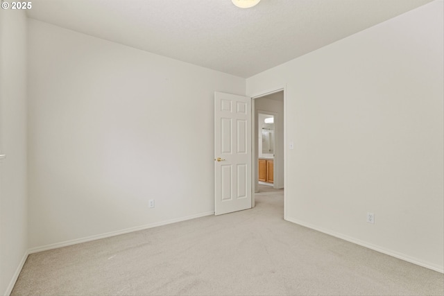 2539 NW 167th Ave, Beaverton, OR 97006 - unfurnished room featuring light colored carpet and baseboards