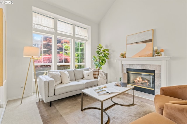 2539 NW 167th Ave, Beaverton, OR 97006 - living area with high vaulted ceiling, a tile fireplace, carpet, and baseboards
