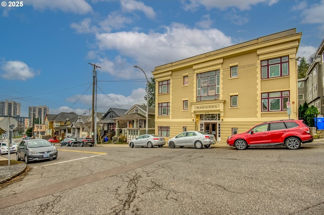 view of building exterior with a residential view