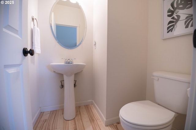 9235 NW Germantown Rd, Portland, OR 97231 - bathroom with toilet and wood finished floors