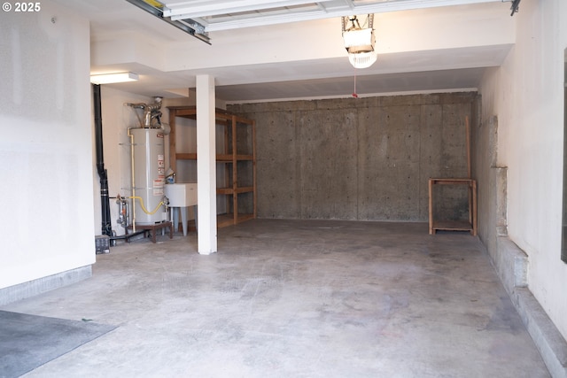 9235 NW Germantown Rd, Portland, OR 97231 - garage featuring water heater and a garage door opener