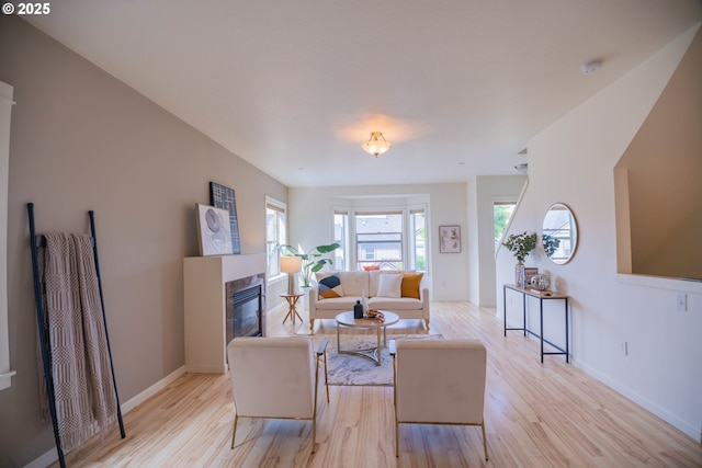 9235 NW Germantown Rd, Portland, OR 97231 - living room with light wood-type flooring and a tile fireplace
