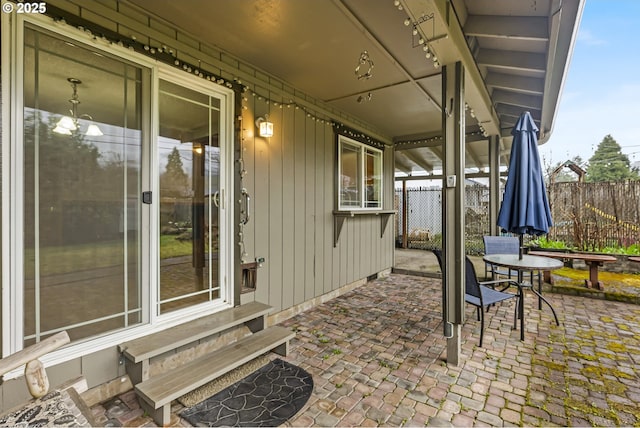 view of patio / terrace featuring fence and entry steps
