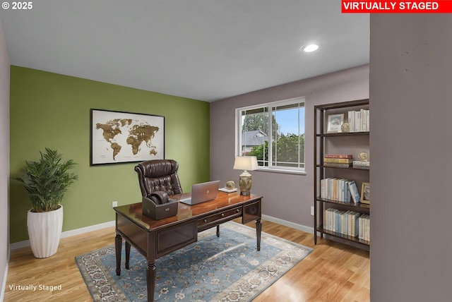 office area with baseboards, light wood-style floors, and recessed lighting