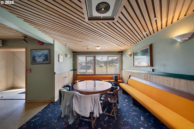 115 8th St, Winchester Bay, OR 97467 - dining area featuring wood walls and wainscoting
