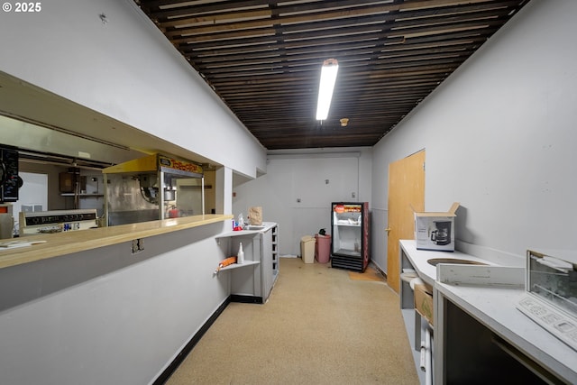 115 8th St, Winchester Bay, OR 97467 - kitchen featuring light countertops and baseboards