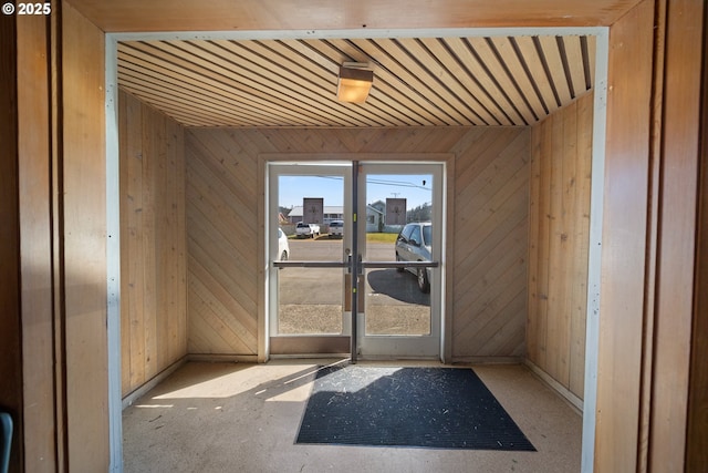 115 8th St, Winchester Bay, OR 97467 - entryway featuring wooden walls and baseboards