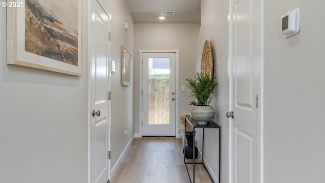 6558 SE Nasha St, Hillsboro, OR 97123 - entryway with light wood-style flooring, baseboards, and recessed lighting
