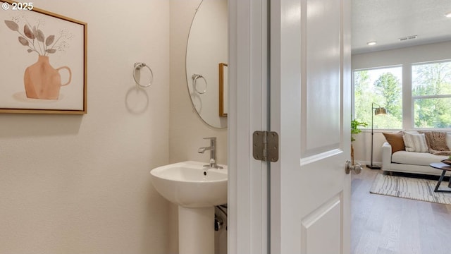 6558 SE Nasha St, Hillsboro, OR 97123 - bathroom with wood finished floors