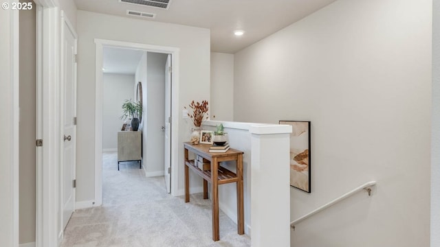 6558 SE Nasha St, Hillsboro, OR 97123 - hallway featuring an upstairs landing, light colored carpet, and baseboards