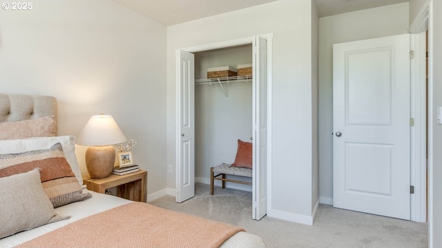 6558 SE Nasha St, Hillsboro, OR 97123 - bedroom with light carpet, baseboards, and a closet