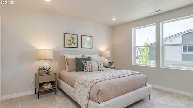 6558 SE Nasha St, Hillsboro, OR 97123 - bedroom featuring light colored carpet, baseboards, and recessed lighting