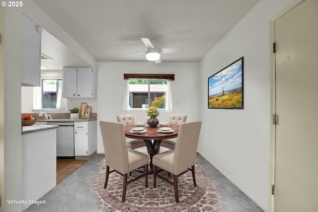 12160 SW Royal Ct Unit D, Portland, OR 97224 - tiled dining space with plenty of natural light and ceiling fan