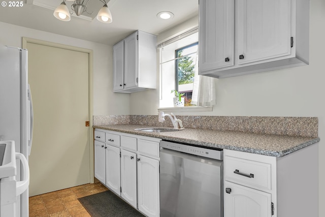 12160 SW Royal Ct Unit D, Portland, OR 97224 - kitchen featuring dishwasher, range, and white cabinetry
