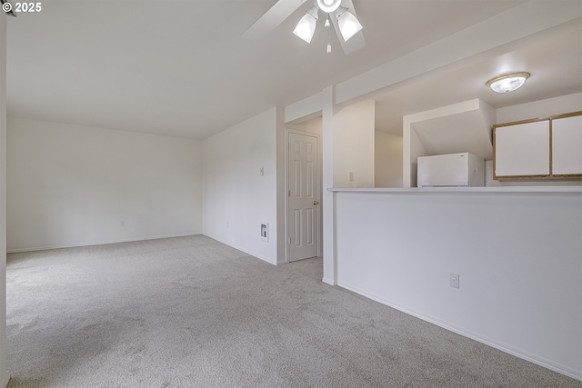 7197 SW Sagert St Unit 103, Tualatin, OR 97062 - unfurnished room featuring carpet floors, a ceiling fan, and baseboards