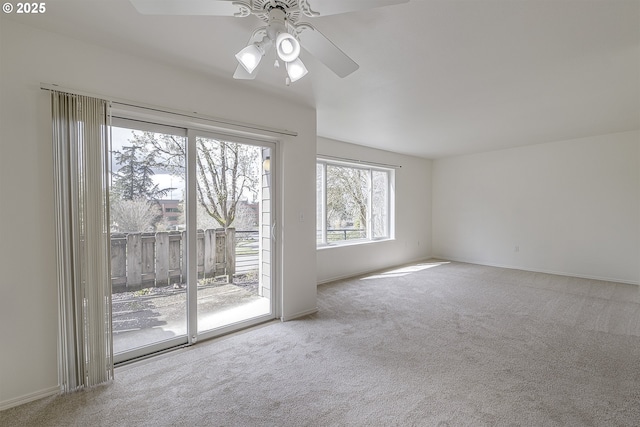 7197 SW Sagert St Unit 103, Tualatin, OR 97062 - carpeted empty room featuring a ceiling fan and baseboards
