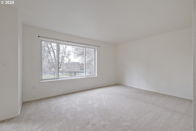 7197 SW Sagert St Unit 103, Tualatin, OR 97062 - unfurnished room with carpet flooring and baseboards