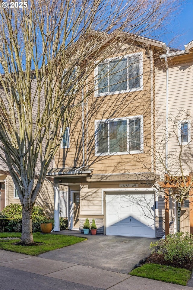 multi unit property featuring a garage