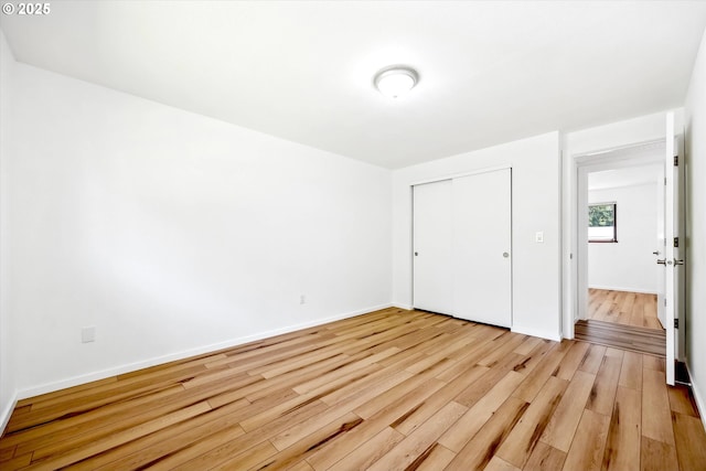 1630 SW Kings Byway, Troutdale, OR 97060 - unfurnished bedroom featuring light wood-style flooring, a closet, and baseboards