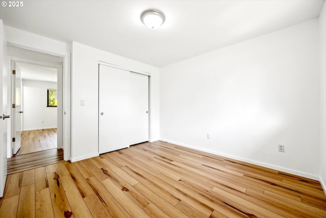 1630 SW Kings Byway, Troutdale, OR 97060 - unfurnished bedroom with light wood finished floors, a closet, and baseboards
