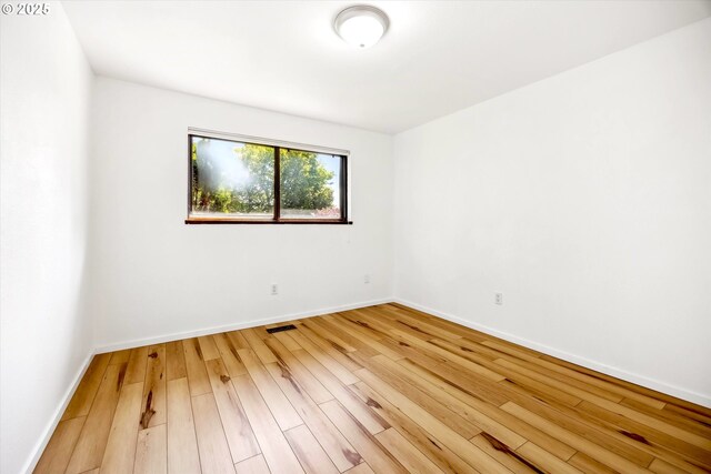 1630 SW Kings Byway, Troutdale, OR 97060 - empty room featuring wood finished floors and baseboards