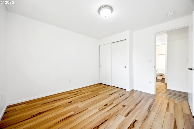 1630 SW Kings Byway, Troutdale, OR 97060 - unfurnished bedroom with wood finished floors, a closet, and baseboards