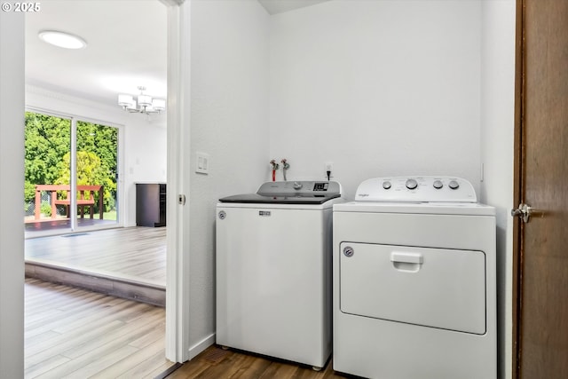 1630 SW Kings Byway, Troutdale, OR 97060 - washroom featuring washing machine and clothes dryer, wood finished floors, and a chandelier