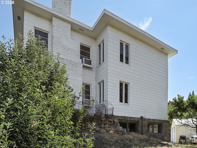 exterior space featuring central air condition unit and cooling unit