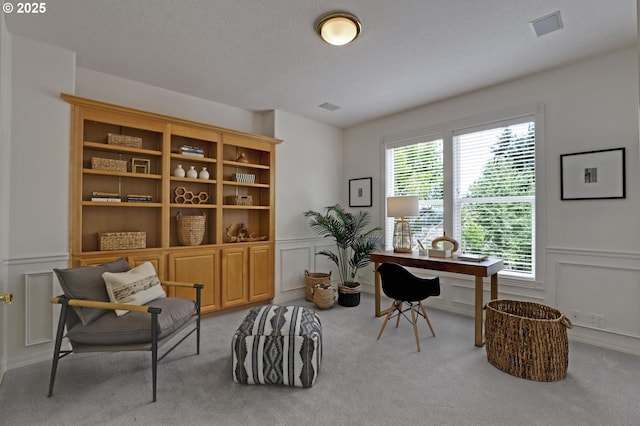 15017 SW Telluride Ter, Beaverton, OR 97007 - office area with a decorative wall, carpet floors, and wainscoting