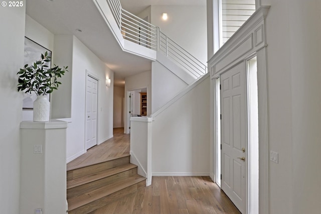 15017 SW Telluride Ter, Beaverton, OR 97007 - foyer featuring hardwood / wood-style floors and stairway