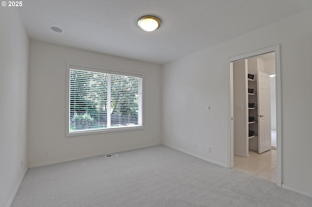 15017 SW Telluride Ter, Beaverton, OR 97007 - carpeted spare room featuring baseboards