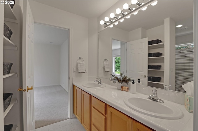 15017 SW Telluride Ter, Beaverton, OR 97007 - bathroom with double vanity and tile patterned floors