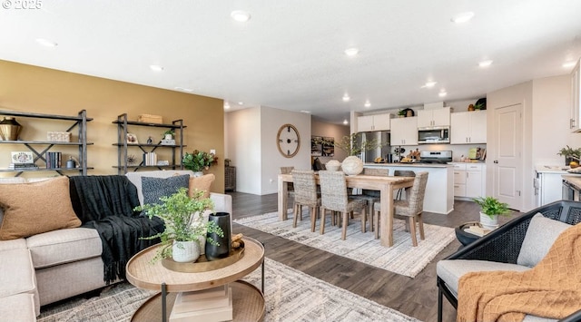 2906 U St, Springfield, OR 97477 - living room featuring dark wood finished floors and recessed lighting