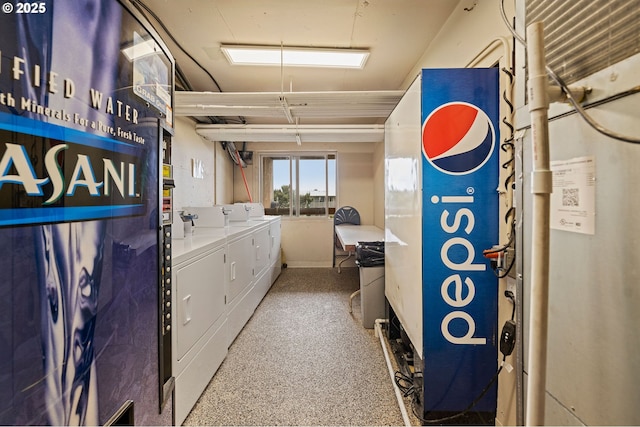 washroom featuring washing machine and dryer