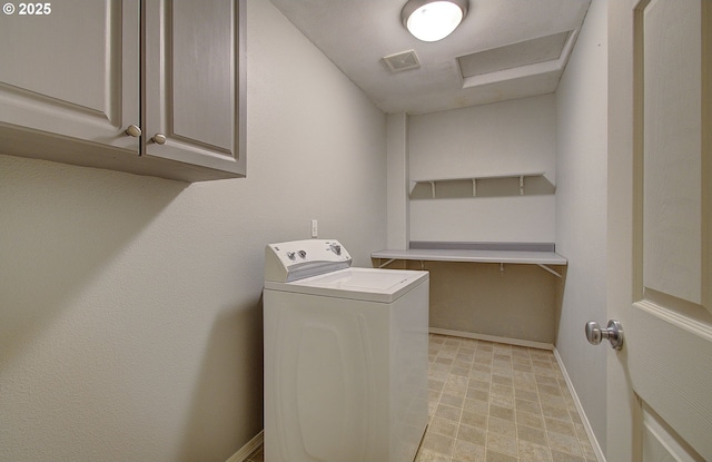 laundry room with washer / dryer, cabinet space, visible vents, and baseboards