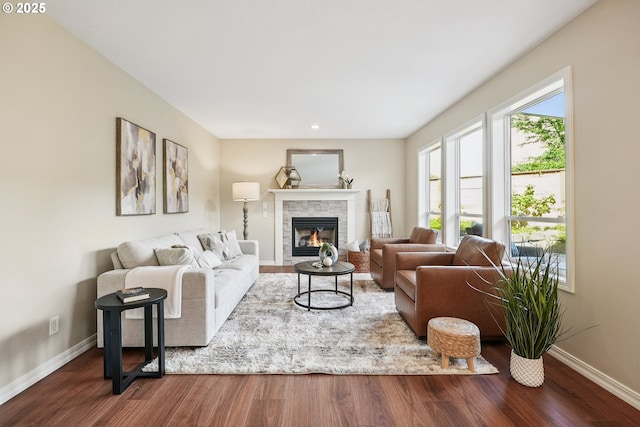7330 SW Kelsi Ct, Portland, OR 97223 - living room featuring baseboards, wood finished floors, a glass covered fireplace, and recessed lighting
