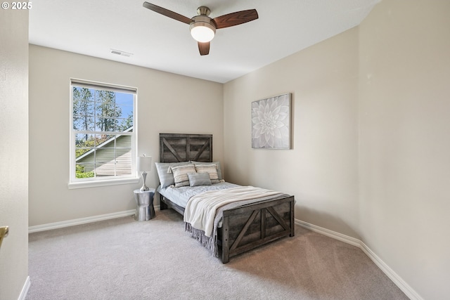 7330 SW Kelsi Ct, Portland, OR 97223 - carpeted bedroom featuring baseboards and ceiling fan