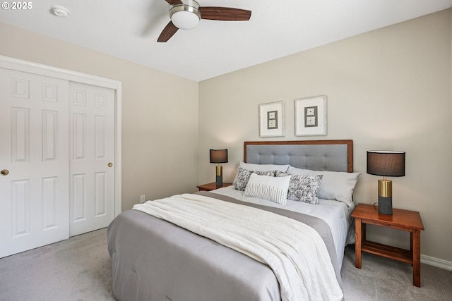7330 SW Kelsi Ct, Portland, OR 97223 - bedroom with carpet floors, a closet, a ceiling fan, and baseboards