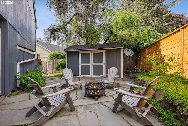 7330 SW Kelsi Ct, Portland, OR 97223 - fenced backyard with an outdoor fire pit and a patio area