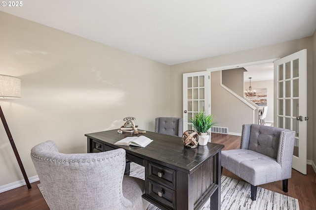 7330 SW Kelsi Ct, Portland, OR 97223 - home office featuring french doors, wood finished floors, a chandelier, and baseboards