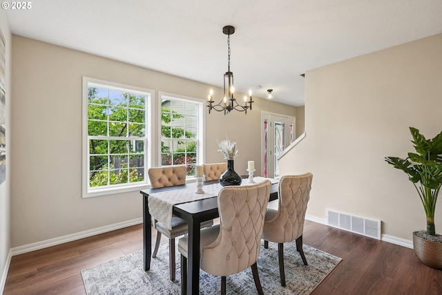 7330 SW Kelsi Ct, Portland, OR 97223 - dining room with a chandelier, healthy amount of natural light, baseboards, and wood finished floors