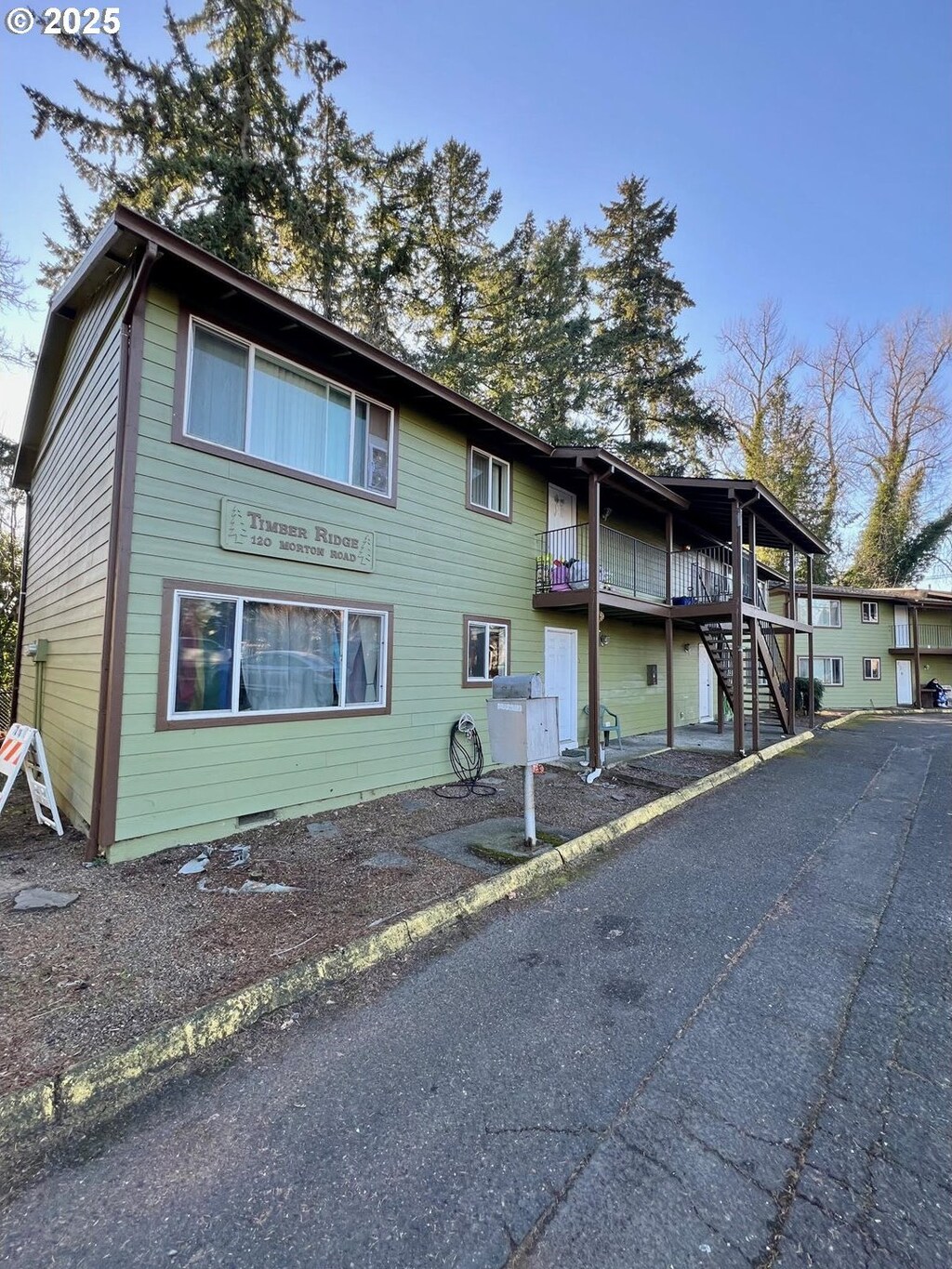 exterior space featuring stairway and crawl space