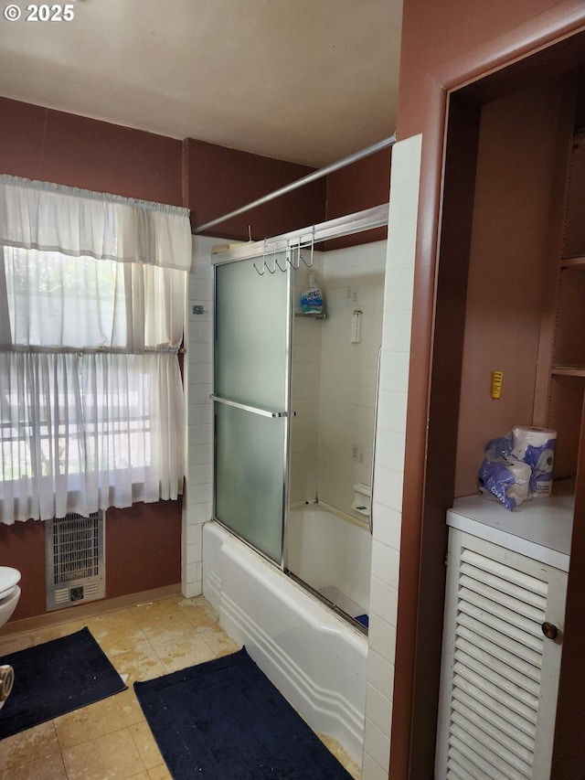 28213 Hunter Creek Hts, Gold Beach, OR 97444 - full bathroom featuring heating unit, enclosed tub / shower combo, and toilet