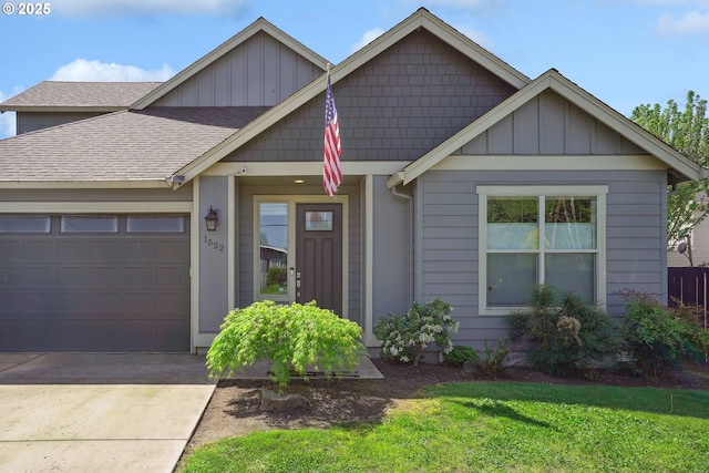 1522 NE Sunrise Ln, Hillsboro, OR 97124 - craftsman house with a shingled roof, a front lawn, a garage, board and batten siding, and driveway