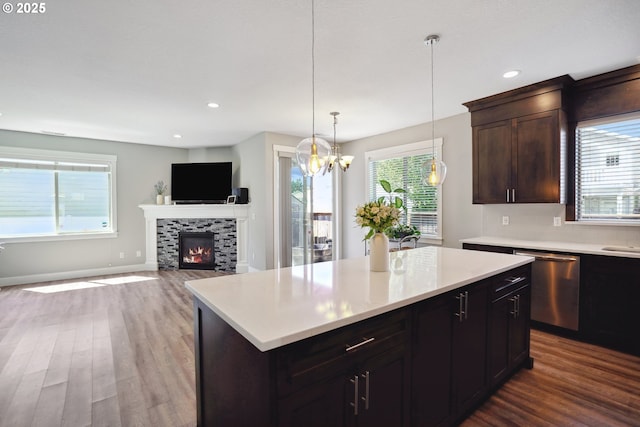 1522 NE Sunrise Ln, Hillsboro, OR 97124 - kitchen featuring light countertops, wood finished floors, and dishwasher