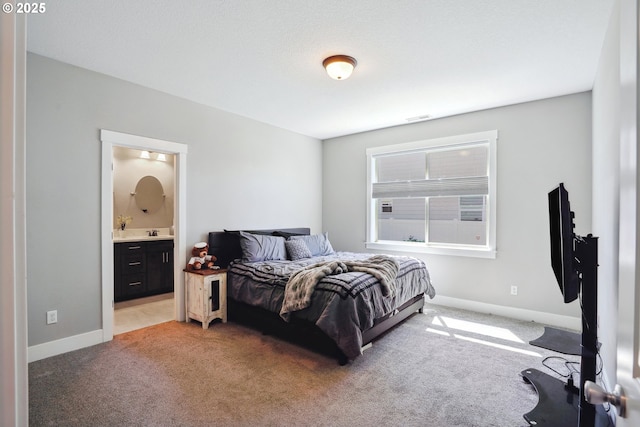 1522 NE Sunrise Ln, Hillsboro, OR 97124 - bedroom featuring baseboards, light carpet, and ensuite bath