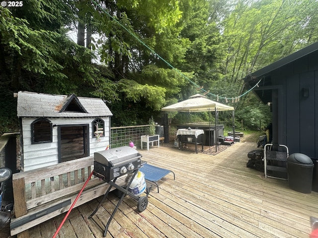 585 Robinhood Ave, Lakeside, OR 97449 - deck with a hot tub and area for grilling