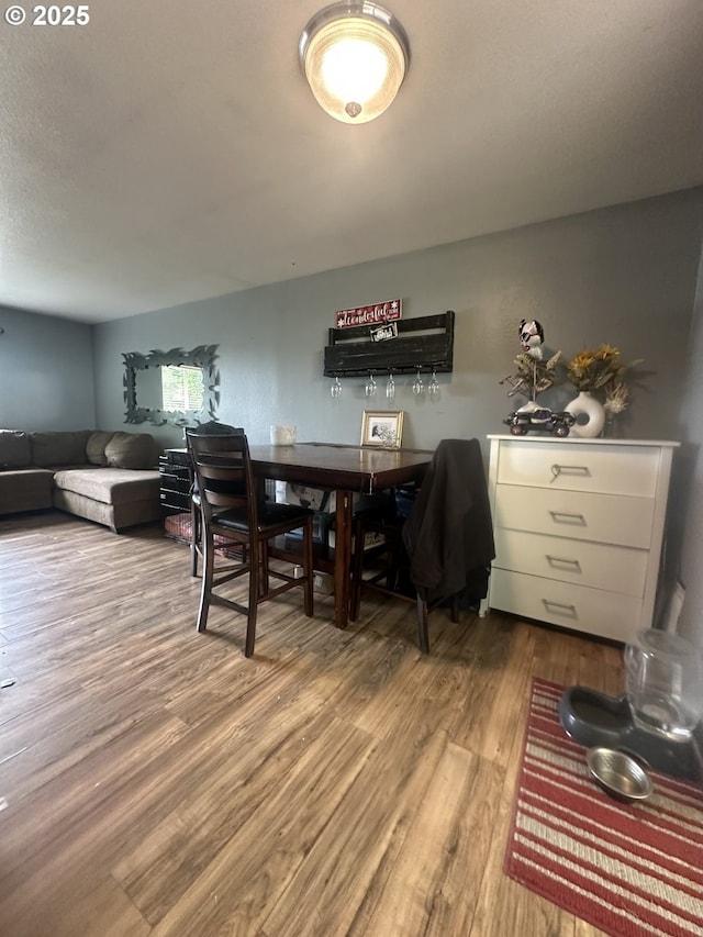 585 Robinhood Ave, Lakeside, OR 97449 - dining area with wood finished floors